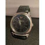 AN EMPORIA ARMANI WRIST WATCH IN WORKING ORDER A/F CRACKED GLASS