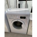 AN INDESIT 7KG WASHING MACHINE, BELIEVED IN WORKING ORDER, NO WARRANTY