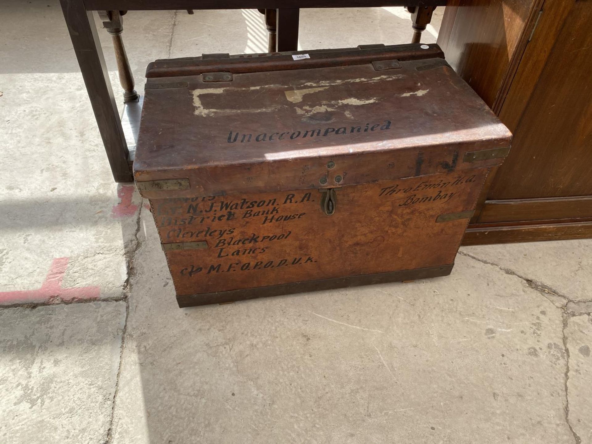 A 19TH CENTURY LEATHER OFFICERS TRAVELLING TRUNK (LT N.M.WATSON C/O MFOPODUK), ALSO INSCRIBED