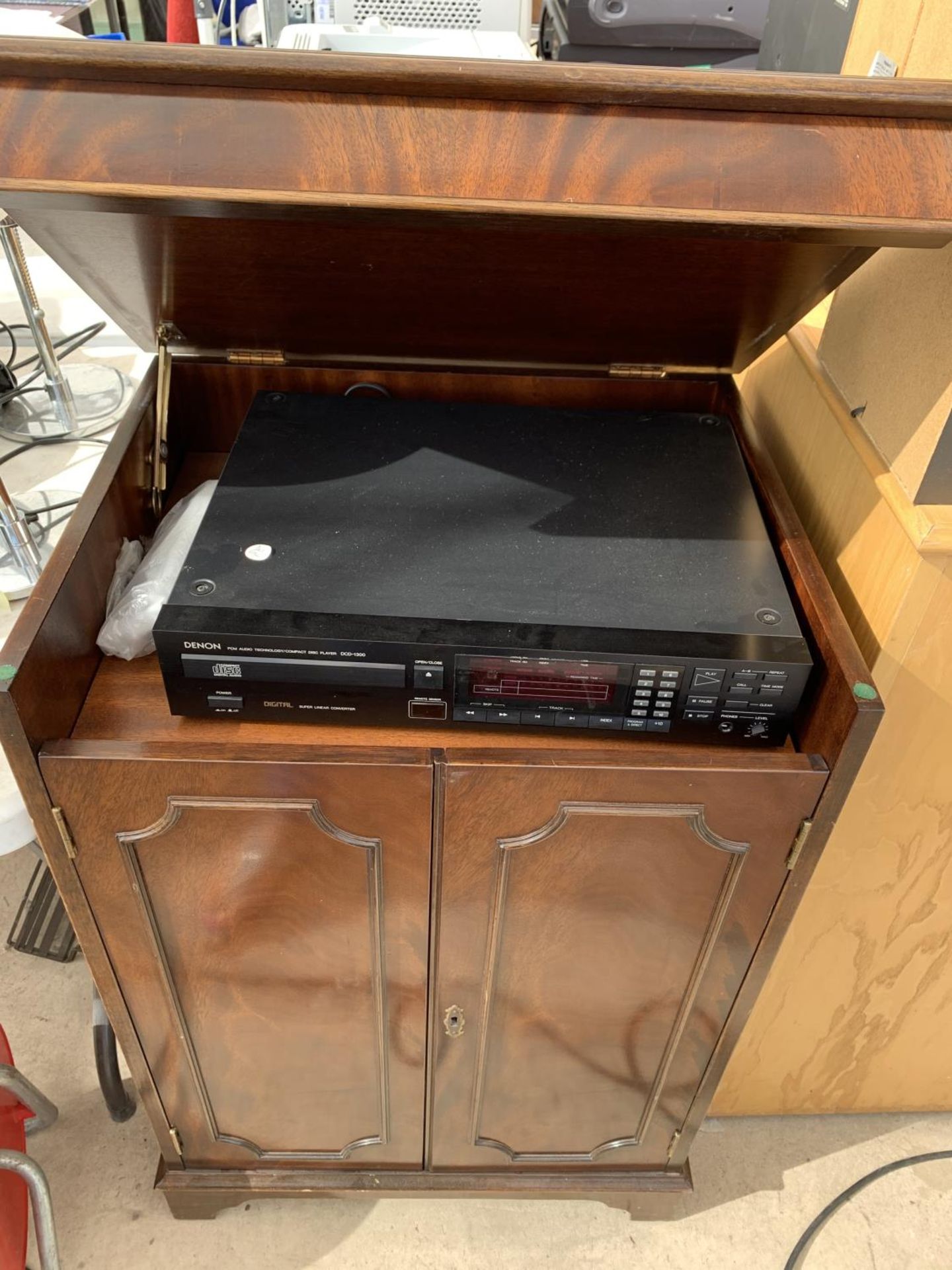 A DENON CD PLAYER, TOGETHER WITH AN AUDIO LAB SELECTOR, IN LOCKABLE CABINET (WITH KEY)