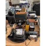 A LARGE QUANTITY OF CAMERAS, VIDEO RECORDERS AND CASES