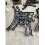 A PAIR OF VINTAGE CAST IRON BENCH ENDS