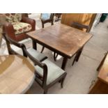 A DRAW LEAF TABLE AND FOUR CHAIRS