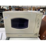 A COOKWORKS MINI DISHWASHER, BELIEVED IN WORKING ORDER, NO WARRANTY