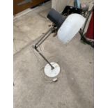 A VINTAGE ANGLE POISE LAMP WITH HEAVY METAL BASE
