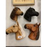 FOUR BOSSONS HORSE HEAD PLAQUES