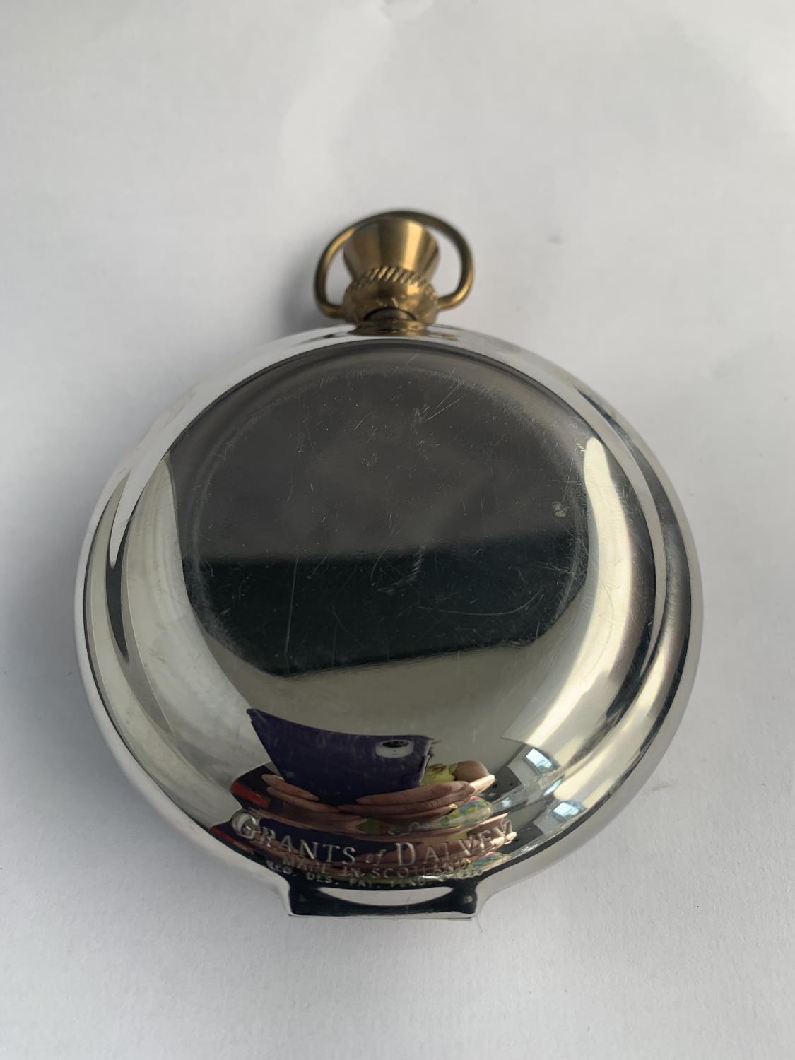 A 'THE DALVEY ST ELMO' TRAVELLING ALARM CLOCK IN THE FORM OF A LARGE POCKET WATCH - Image 5 of 5