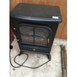 AN ELECTRIC WOOD BURNING STOVE STYLE HEATER