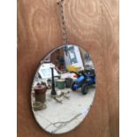 A BEVELL EDGED CIRCULAR MIRROR