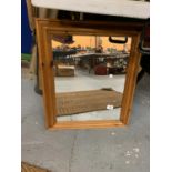 A PINE FRAMED MIRROR