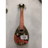 A SMALL MUSICAL MANDOLIN