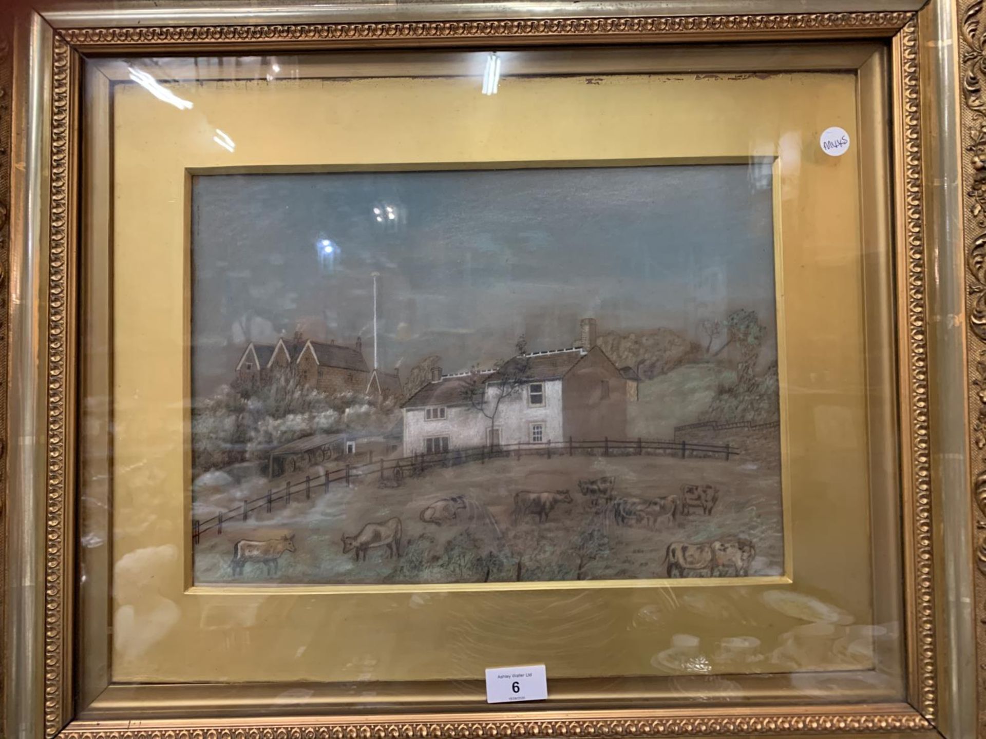 A GILT FRAMED PASTEL ON BOARD OF A FARMING SCENE