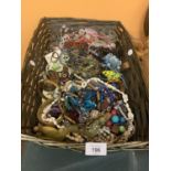 A BASKET CONTAINING A LARGE QUANTITY OF COSTUME JEWELLERY