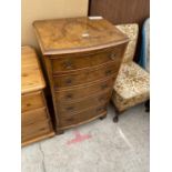 A REPRODUCTION WALNUT BOW FRONT CHEST OF FIVE DRAWERS