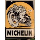 A RECTANGULAR BLACK AND YELLOW METAL MICHELIN SIGN