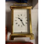 A BAYARD EIGHT DAY BRASS CARRIAGE CLOCK WITH GLASS SIDES