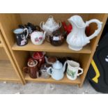 VARIOUS COLLECTABLE TEAPOTS AND JUGS