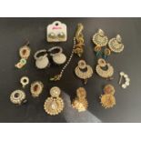 A QUANTITY OF ORNATE FASHION EARRINGS