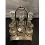 A SILVER PLATE AND CUT GLASS SIX PIECE CRUET SET