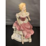 A CINDERELLA FIGURINE BY GERDA NEUBACHER