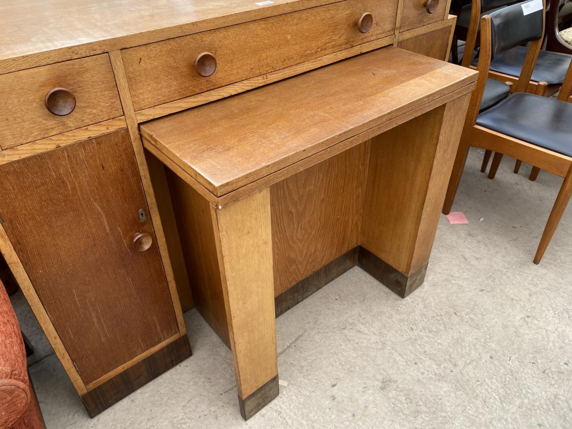 A HEAVY OAK HIGH TWIN PEDESTAL DESK WITH PULL OUT CENTRE SECTION WITH FOLD OVER TOP - Image 5 of 5