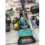 THREE ITEMS TO INCLUDE A BOSCH LAWNMOWER, BLACK AND DECKER LAWNRAKER AND A PRESSURE WASHER