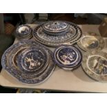 AN ASSORTMENT OF BLUE AND WHITE CERAMICS INCLUDING A PAIR OF LARGE MEAT PLATES AND MATCHING TUREEN