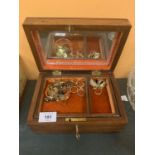 AN INLAID WOODEN JEWELLERY BOX WITH MIRROR, INNER TRAY,KEY AND A LARGE QUANTITY OF COSTUME JEWELLERY