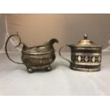 A WHITE METAL BELIEVED TO BE SILVER, CREAM JUG 101G AND A SILVER PLATED MUSTARD POT WITH BLUE