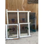 A QUANTITY OF LEAD GLASS WINDOW PANELS FRAMED AND UNFRAMED