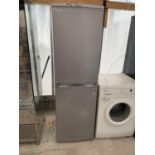 A HOTPOINT AQUARIUS FRIDGE FREEZER, BELIEVED IN WORKING ORDER, NO WARRANTY