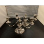 A PAIR OF ORNATE SILVER PLATED CANDELABRAS