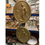 A PAIR OF LARGE GOLD COVERED PLASTER PLAQUES IN THE GREEK STYLE