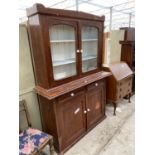 A VICTORIAN PAINTED PINE TWO DOOR BOOKCASE ON BASE, 54" WIDE