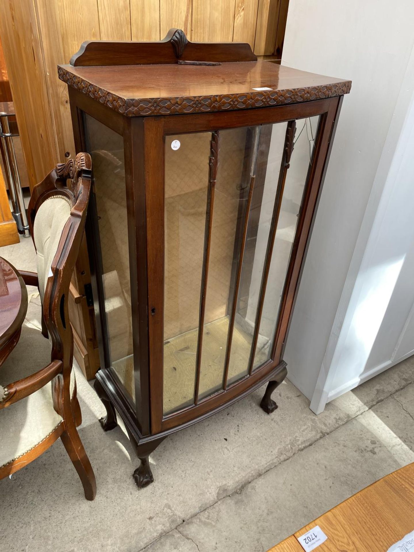 A MID 20TH CENTURY MAHOGANY CHINA CABINET ON BALL AND CLAW FEET