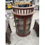 A MAHOGANY BOW FRONT DISPLAY CABINET WITH TWO GLAZED DOORS