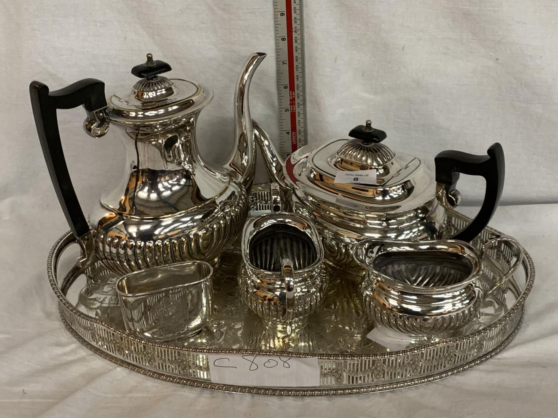 A FIVE PIECE SILVER PLATED TEA AND COFFEE SET WITH MATCHING TRAY