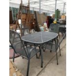 A METAL RECTANGULAR GARDEN TABLE WITH FOUR MATCHING CHAIRS