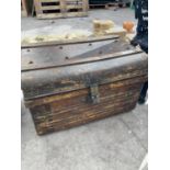 A VINTAGE METAL TRUNK