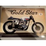 A METAL SIGN FOR A BSA GOLD STAR MOTORBIKE