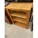 A PINE THREE TIER OPEN BOOKCASE