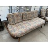 AN ERCOL THREE SEATER STUDIO COUCH/DAY BED
