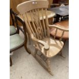 A VICTORIAN STYLE FARMHOUSE ROCKING CHAIR