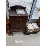 AN EDWARDIAN SIX DRAWER MUSIC CHEST ON CABRIOLE LEGS TOGETHER WITH A QUANTITY OF MUSIC AND MAGAZINES