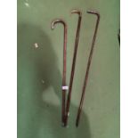 THREE WALKING STICKS WITH WHITE METAL FINIALS