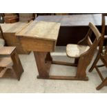 A VICTORIAN PITCH PINE SCHOOL DESK AND CHAIR