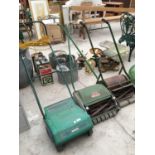 AN ELECTRIC LAWN RAKER AND TWO VINTAGE PUSH MOWERS BELIEVED IN WORKING ORDER, BUT NO WARRANTY