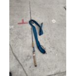 A ONE PIECE FISHING ROD WITH ROD BAG