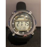 AN UMBRO DIGITAL WRIST WATCH IN WORKING ORDER