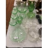 A QUANTITY OF GLASS INCLUDING GREEN GLASS BOWLS